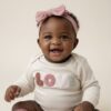 CREAM & DUSTY PINK BABY BODYSUIT SET.