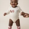 CREAM & DUSTY PINK BABY BODYSUIT SET.
