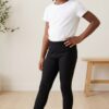 BLACK COTTON RIBBED KNIT LEGGINGS.